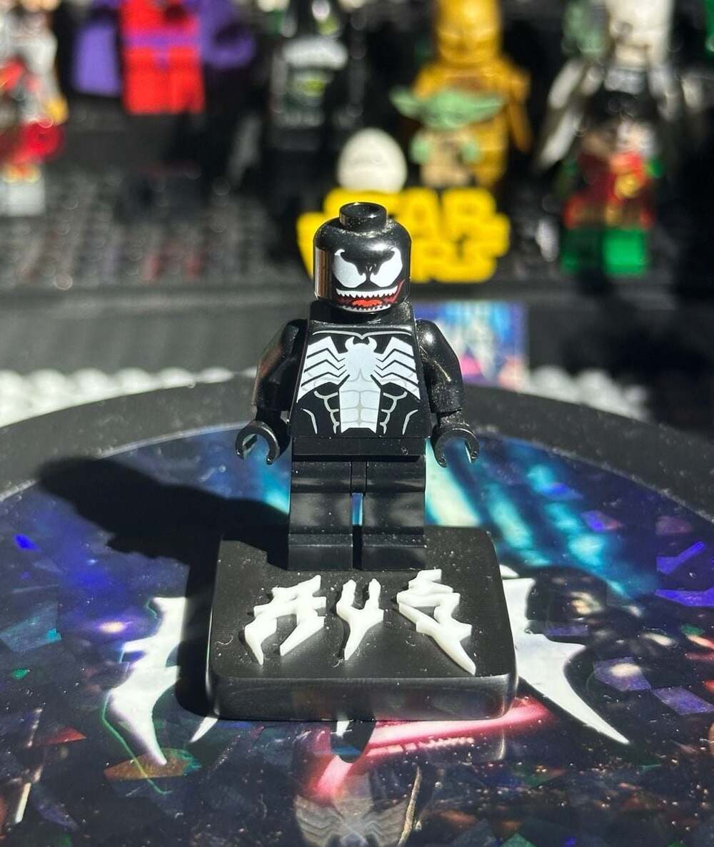 LEGO Marvel Venom Minifigure with White Chest Spider and Red Mouth on Display St